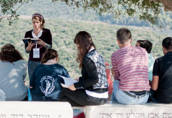 Students from Shalem College attend a seminar at Tel Azekah, an archeological site not far from Jerusalem where plaques describe the nearby mythical battle between David and Goliath. Photo: Maoz Vaystooch